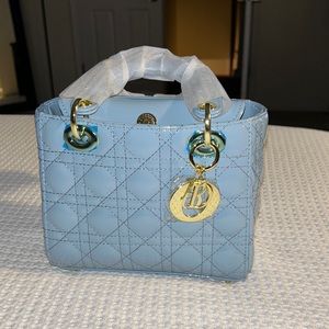Baby Blue shiny leather handbag